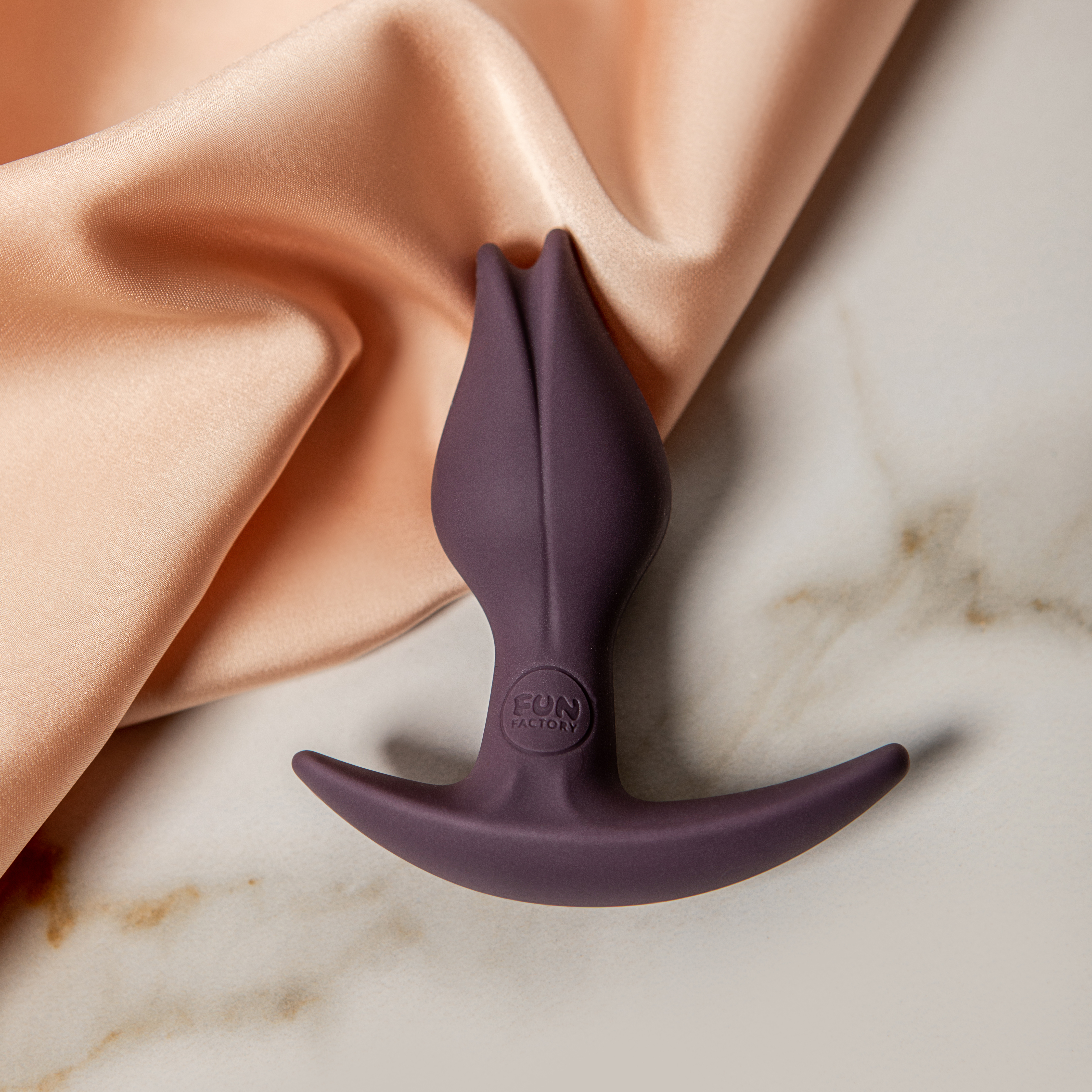 Fun Factory Bootie Fem - Korek analny, Fioletowy ▶️▶️ DYSKRETNIE ▶️ GWARANCJA ▶️ PRZESYŁKA 24h ▶️